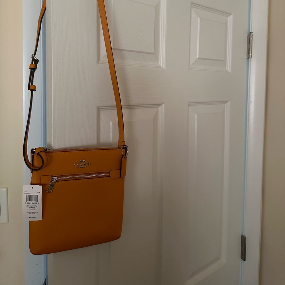 Brand new with tags Coach crossbody pocketbook